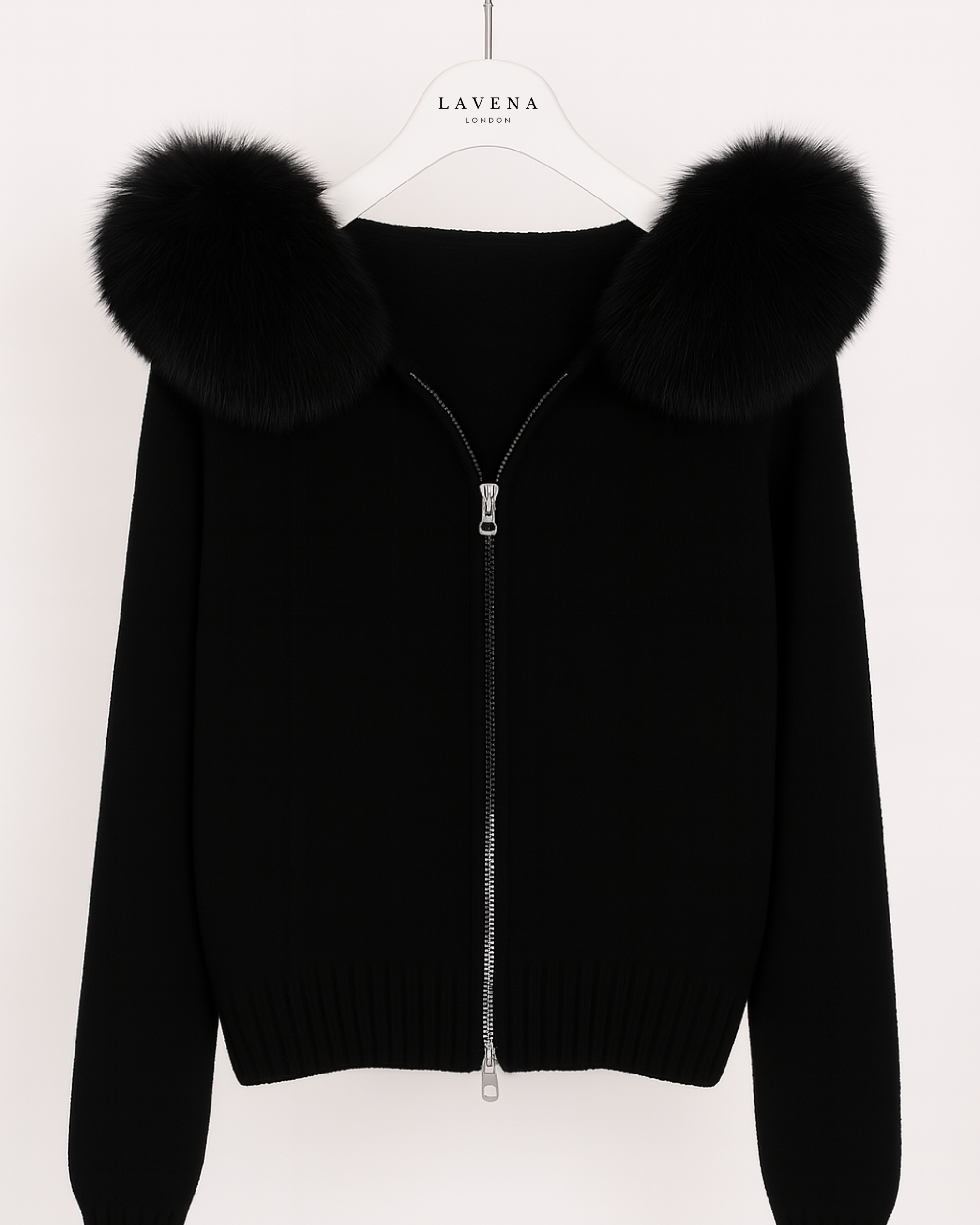 Black zip-up hoodie with fur collar on a white background